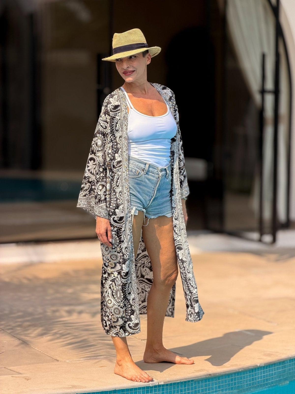 Monochromatic Paisley Kimono Over Tank and Shorts With Straw Hat — Elegant Boho Outfits