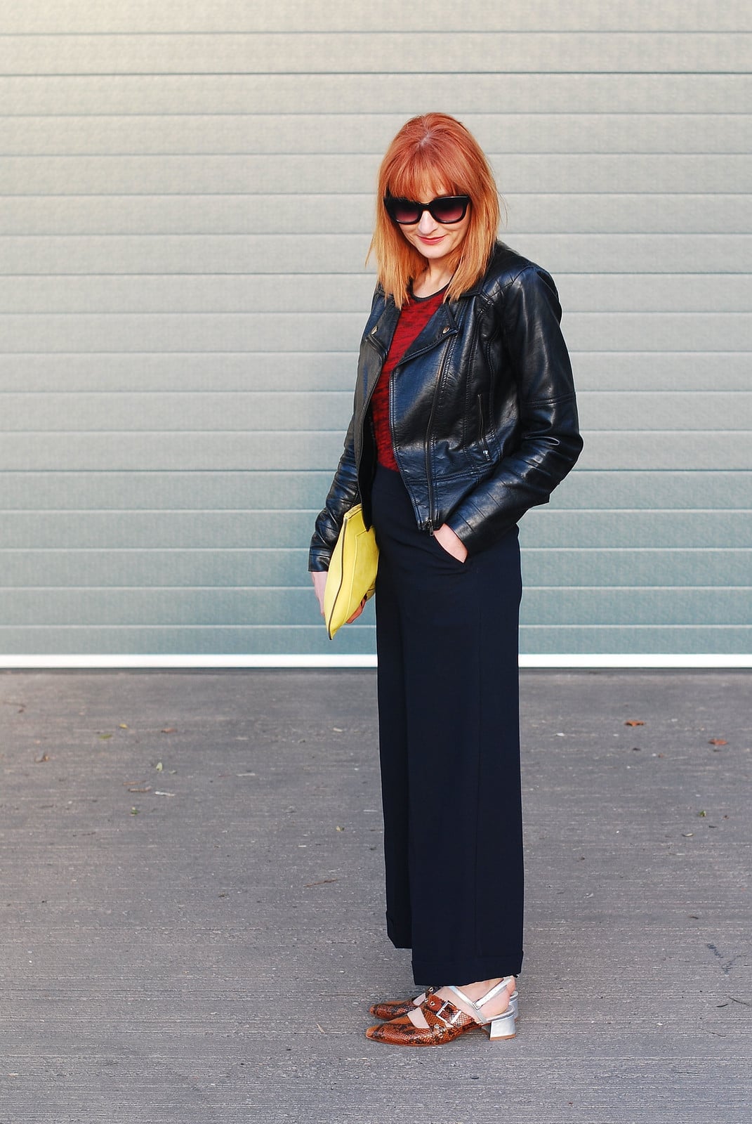 Black Leather Blazer Over Red Top and Navy Wide-Leg Trousers — Elegant Rock Outfits