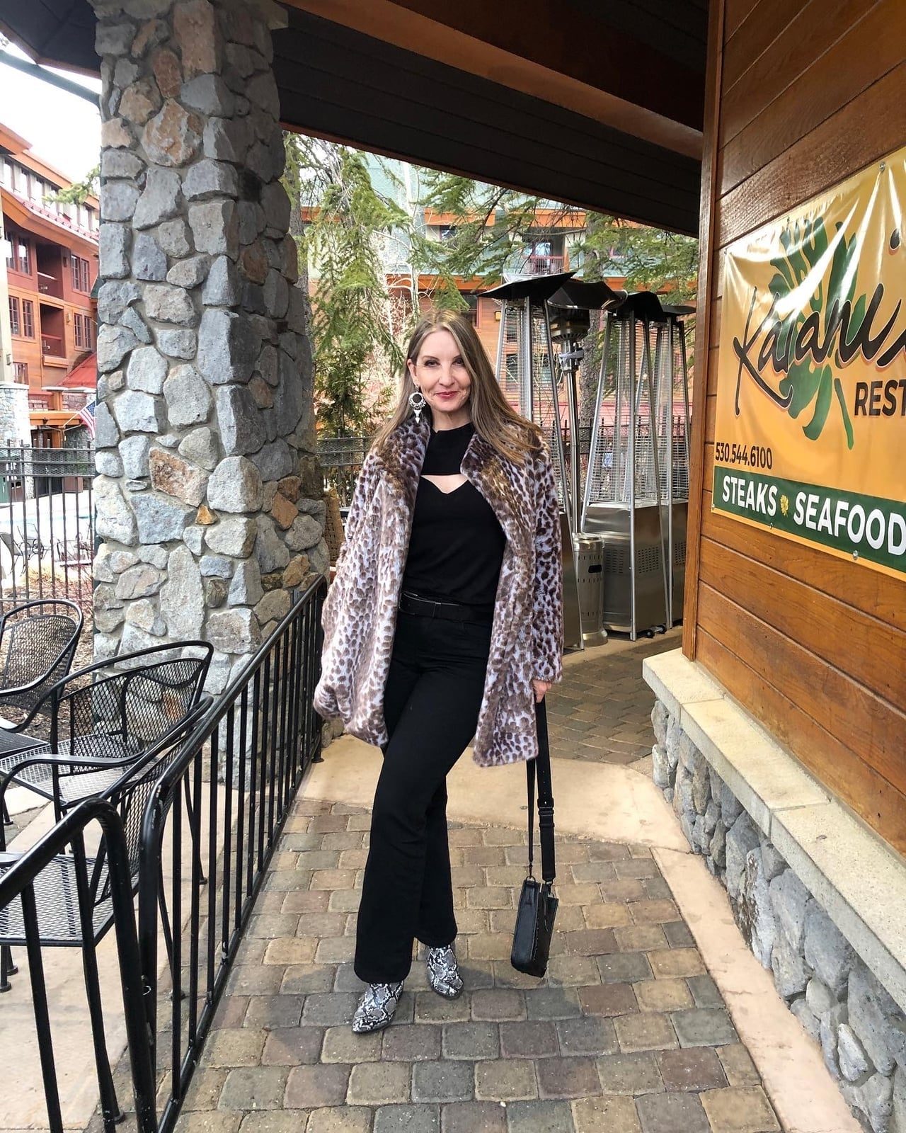 Leopard Print Faux Fur Coat Over Black Outfit — Elegant Rock Outfits