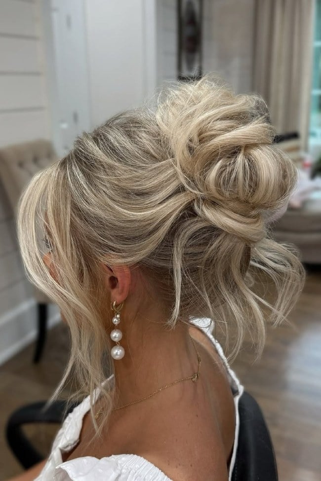 Messy Bridal Updo With Curtain Bangs — Elegant Updo Inspo