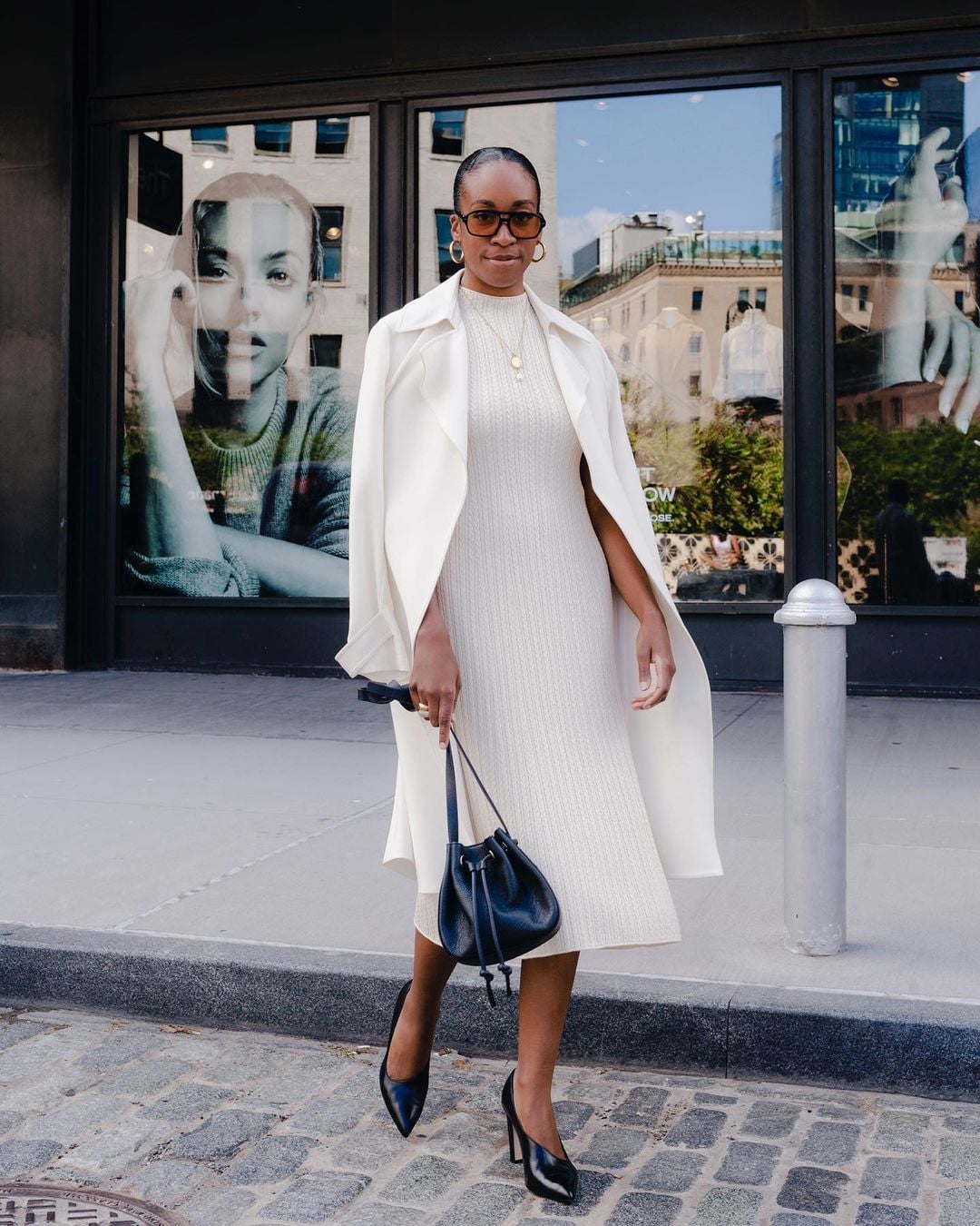 Cream Knit Dress With Draped White Long Coat and Black Bucket Bag — Elegant White Jacket Outfit