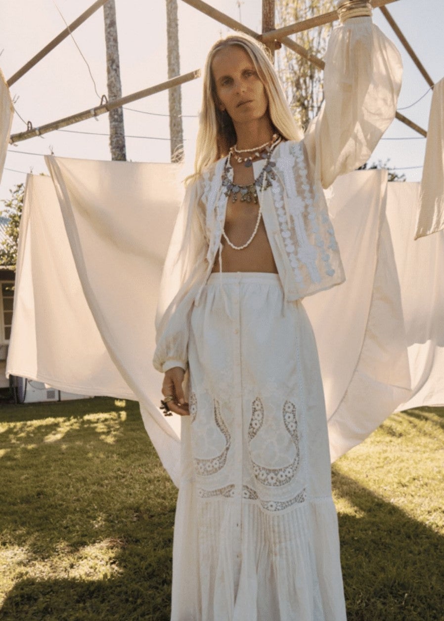 White Tiered Maxi Skirt With Vest And Top White Tiered Maxi Skirt With Vest And Top — Elegant White Maxi Skirt Outfit