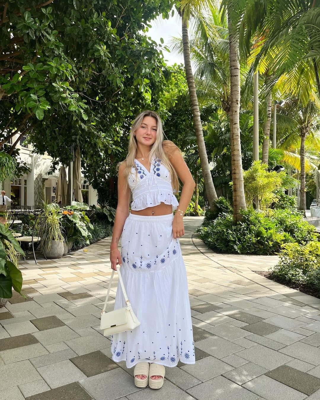 White Embroidered Maxi Skirt With Halter Top White Embroidered Maxi Skirt With Halter Top — Elegant White Maxi Skirt Outfit