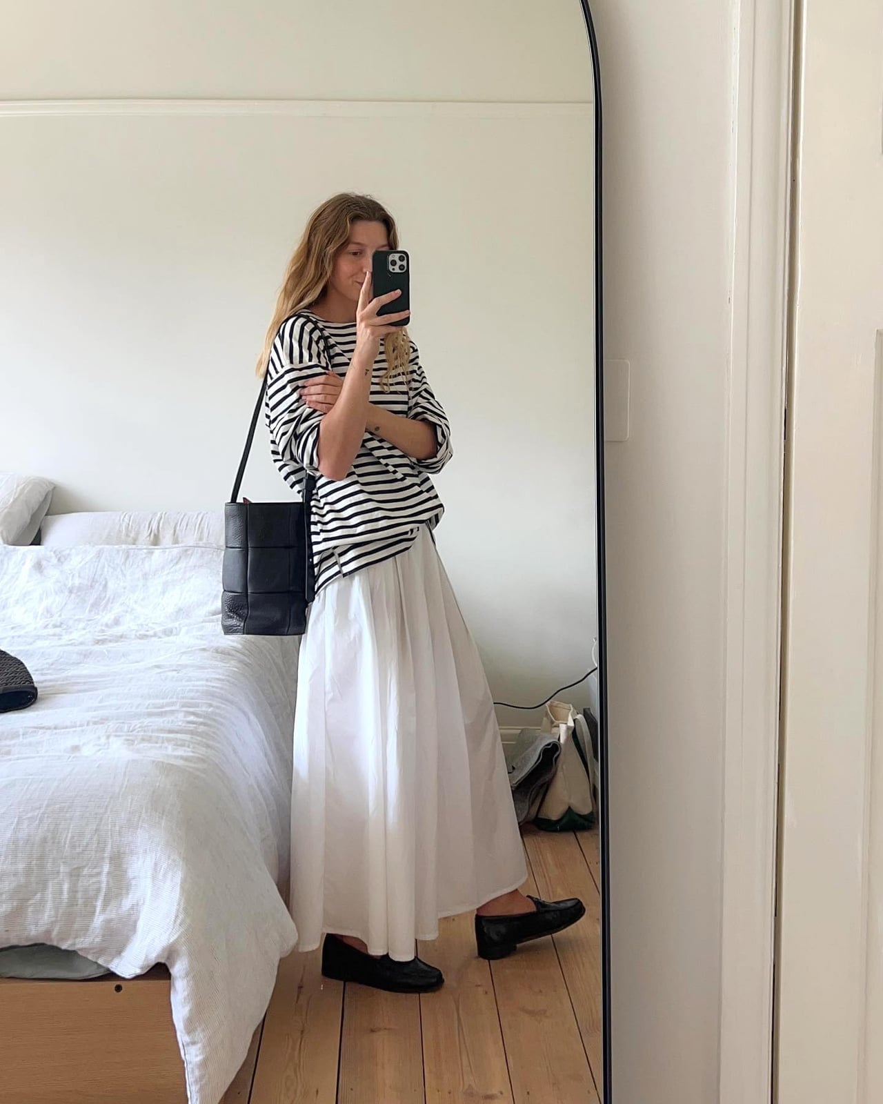 White Pleated Maxi Skirt With Striped T-shirt and Black Loafers White Pleated Maxi Skirt With Striped T-shirt and Black Loafers — Elegant White Maxi Skirt Outfit