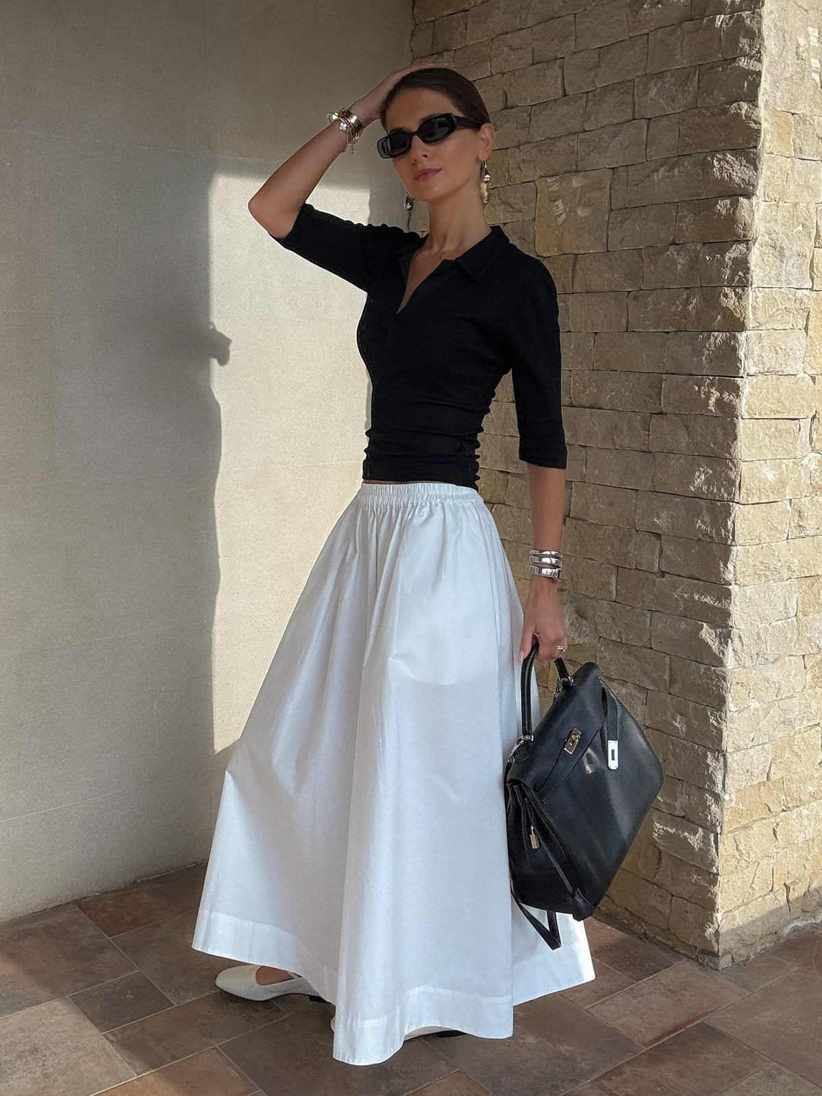 Voluminous White Maxi Skirt With Black Polo Voluminous White Maxi Skirt With Black Polo — Elegant White Maxi Skirt Outfit