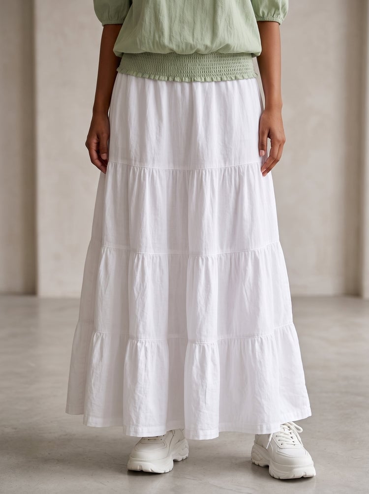 White Tiered Maxi Skirt With Green Puff Sleeve Top White Tiered Maxi Skirt With Green Puff Sleeve Top — Elegant White Maxi Skirt Outfit