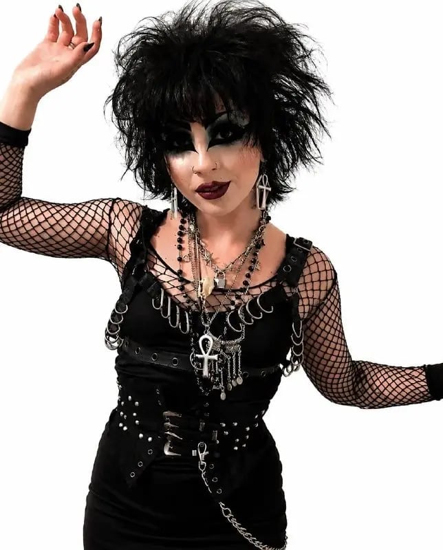 Studded Harness and Fishnet Layering Studded Harness and Fishnet Layering — Goth Style Ideas
