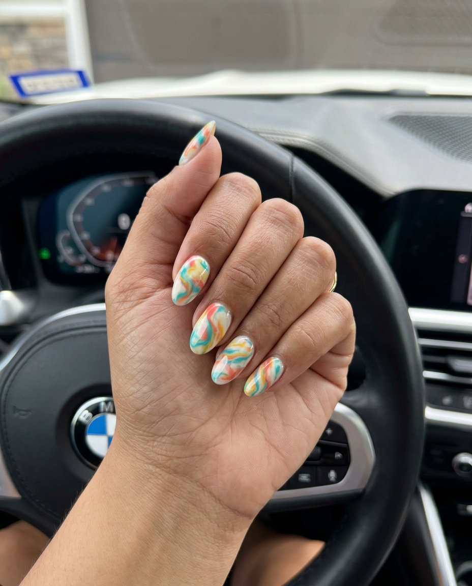 Summer Swirl Marble Oval nails for june manicure ideas - summer trends 2026. Bohemian and artistic.