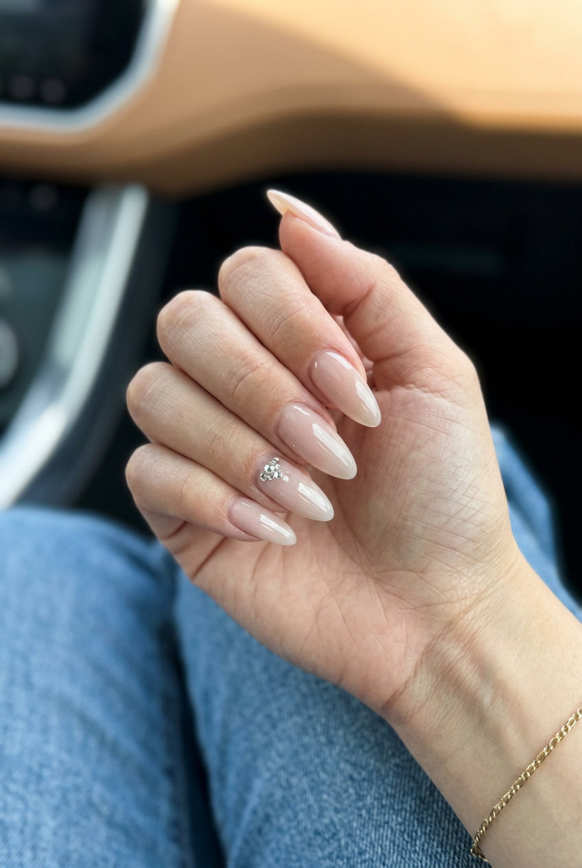 June nails ideas - summer 2026: Glamorous crystal accent almond nails for weddings and date nights.