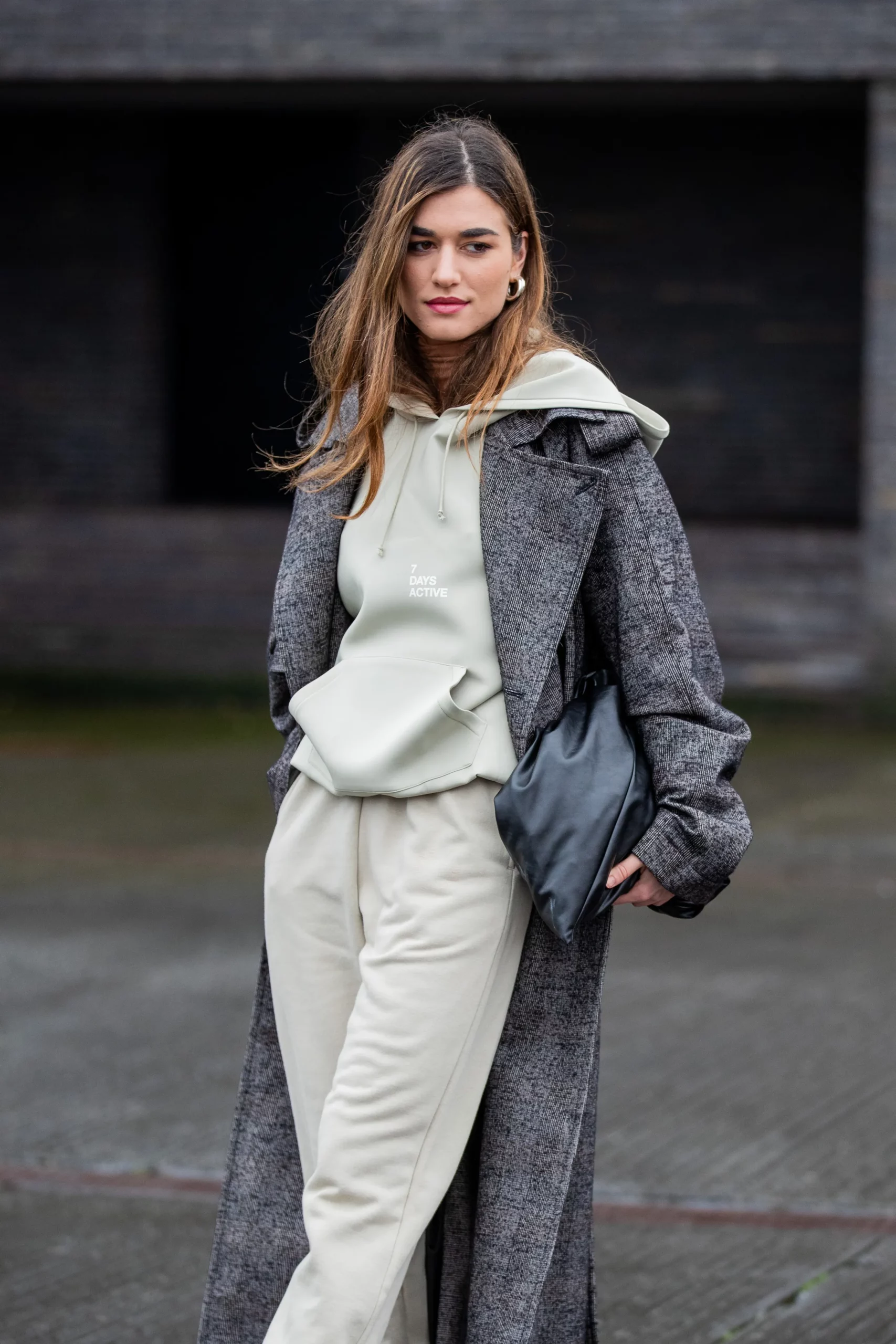 Hoodie Under a Patterned Long Coat with Relaxed Trousers — Casual Winter Outfits