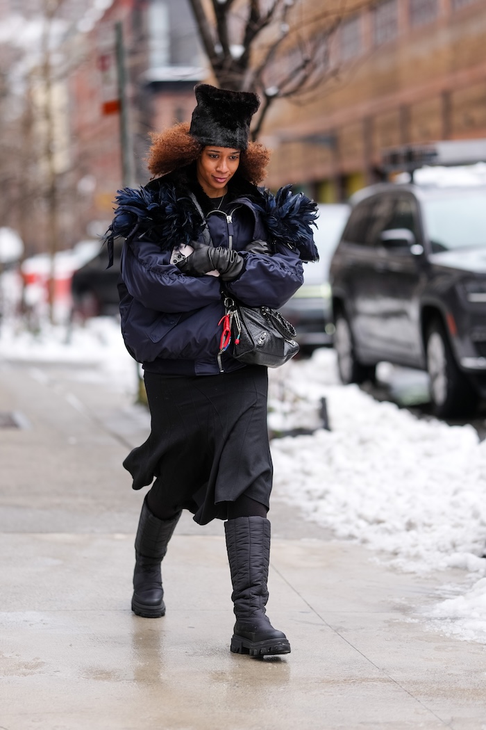 Feather-Trimmed Puffer Jacket for a Glamorous Winter Look — Winter Outfits for Black Girls