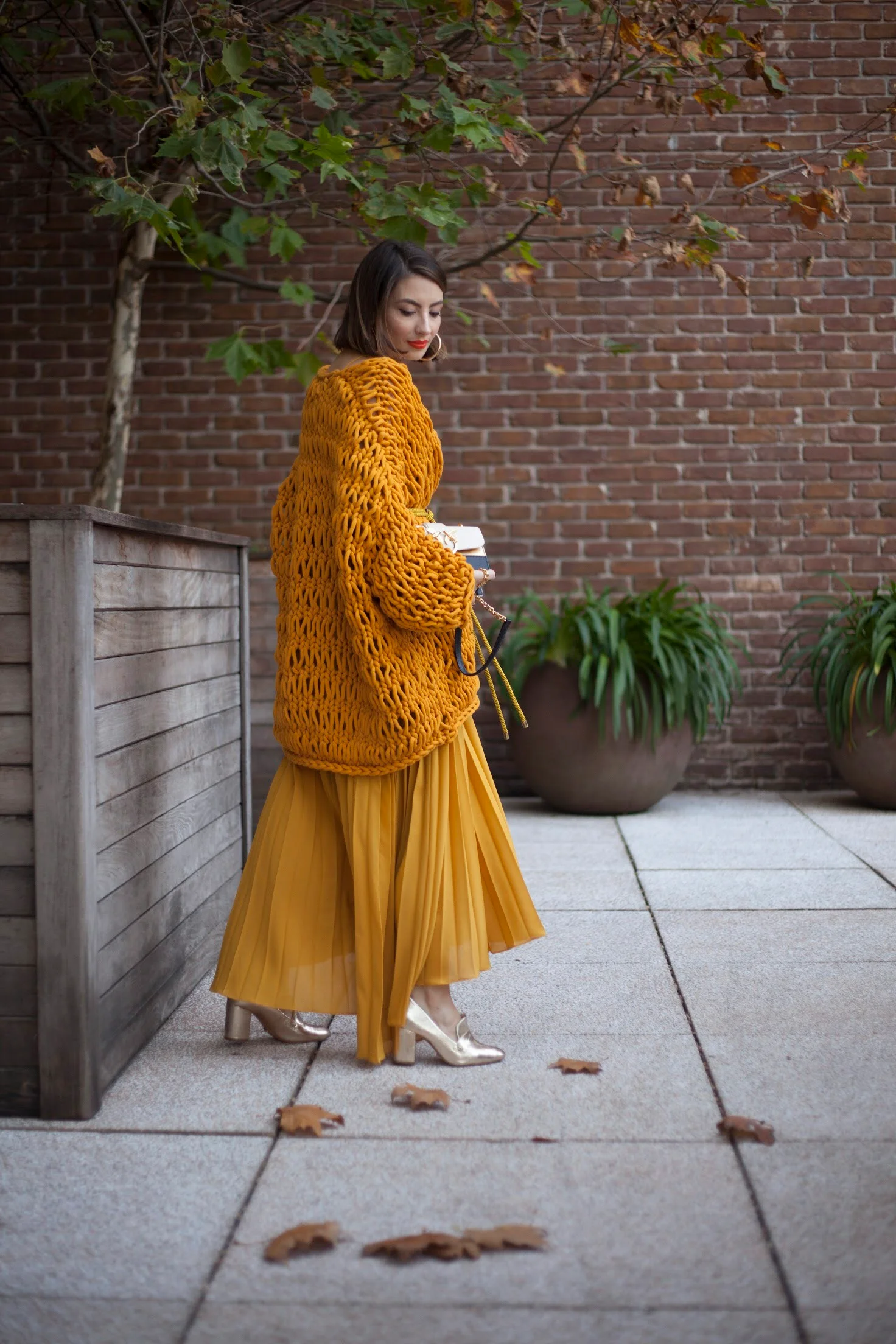 Ochre Chunky Knit Cardigan Over Pleated Midi Skirt for Brunch Ochre Chunky Knit Cardigan Over Pleated Midi Skirt for Brunch — Winter Brunch Outfits