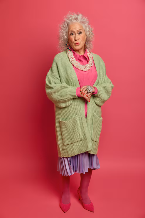 Pastel Knit Cardigan with Pleated Skirt Ensemble — Winter Outfits for Women Over 70