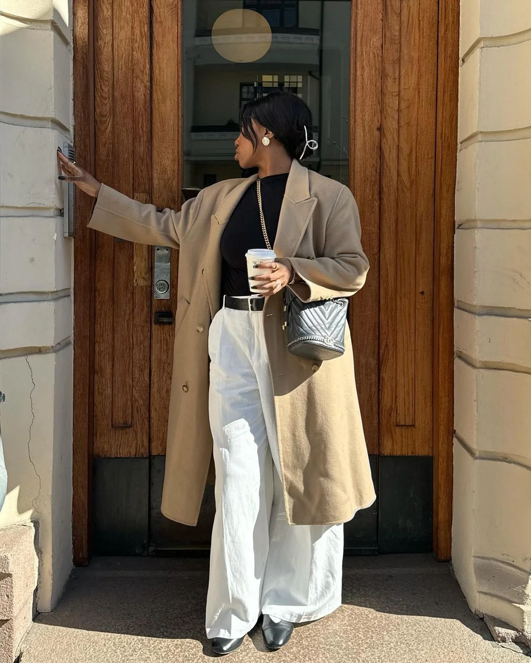 Camel Coat with Black Top and White Trousers for Casual Sophistication — Old Money Winter Outfits