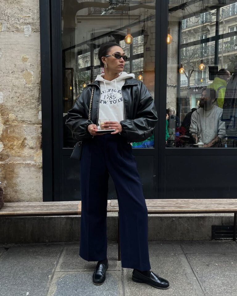 Black Leather Bomber Jacket with Graphic Hoodie and Loafers — NYC Winter Outfits