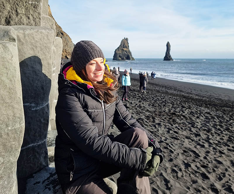Black Puffer with Bright Lining and Knit Accessories — Iceland Winter Outfits