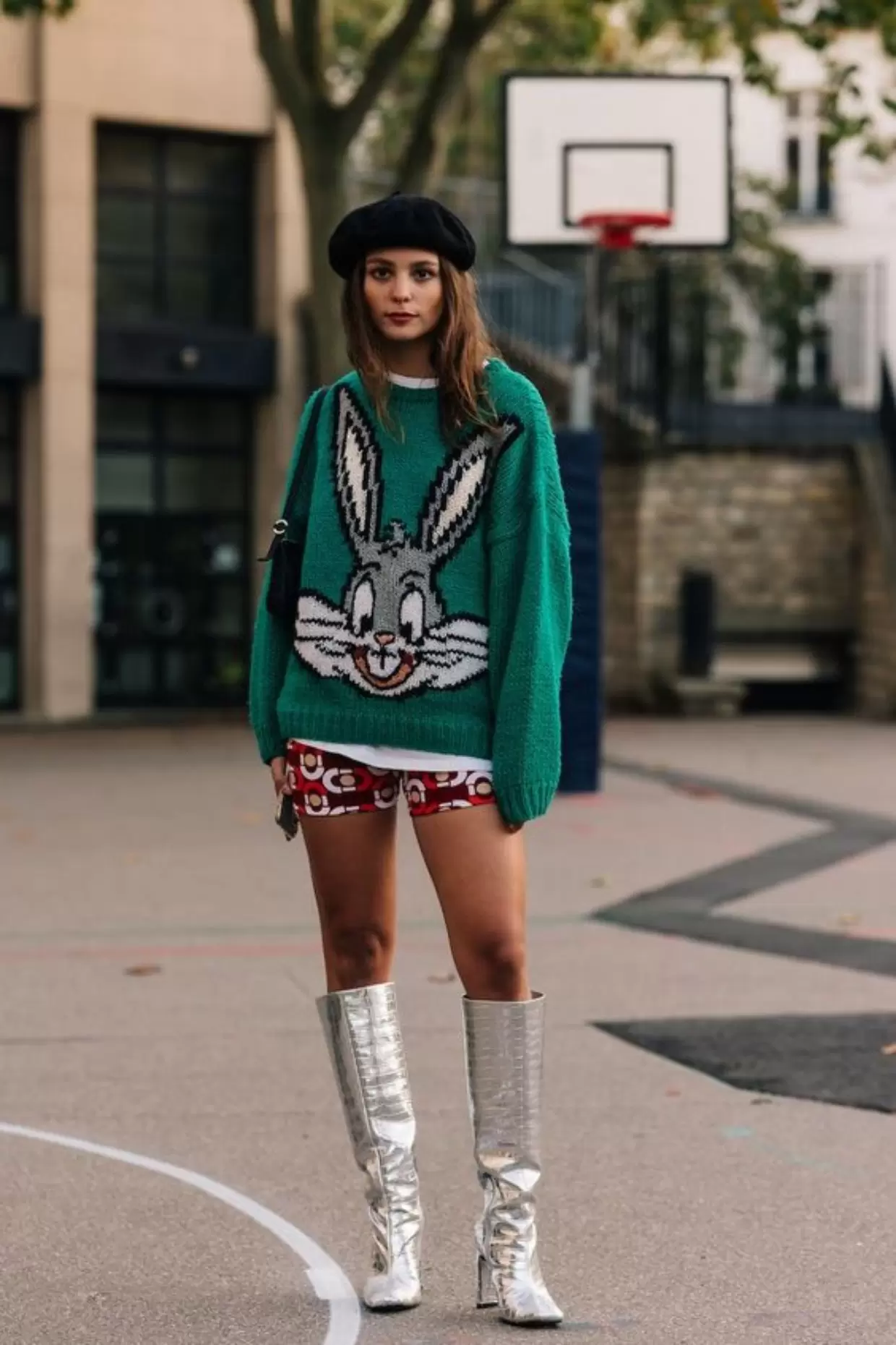 Graphic Knit Sweater with Red Shorts and Silver Boots — Winter Outfits for Warm Weather