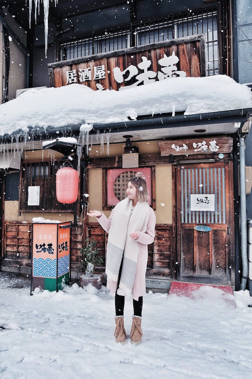 Cozy Elegance: Light Pink Long Coat in a Snowy Setting — Japan Winter Outfits