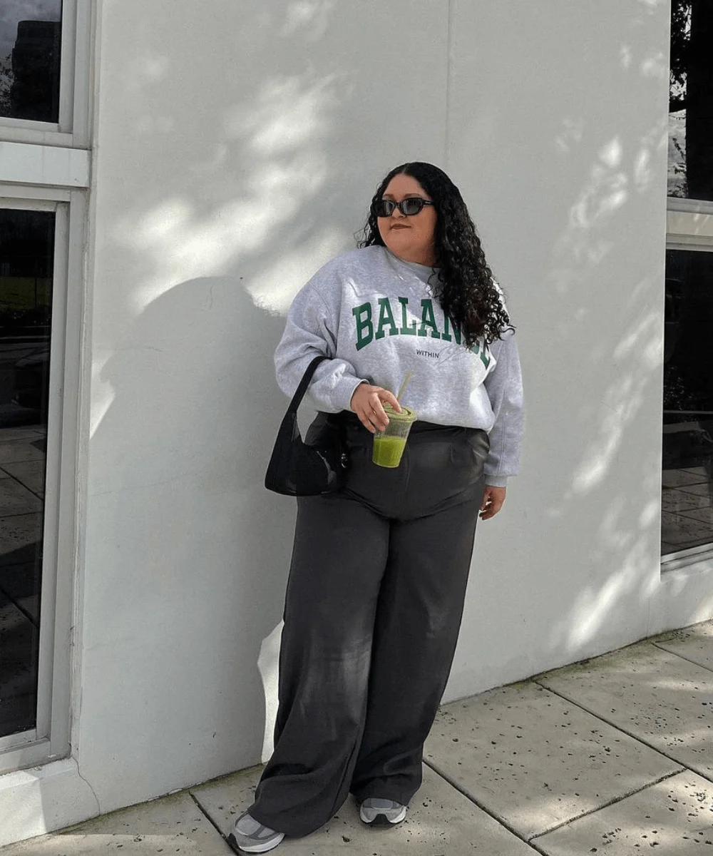 Graphic Sweatshirt with Faux Leather Pants for Casual Comfort — Chicago Winter Outfits