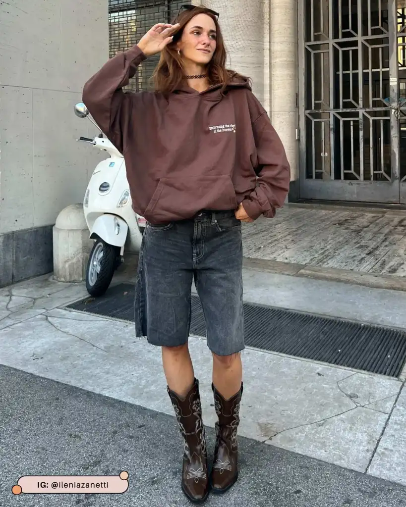 Brown Graphic Hoodie with Denim Shorts and Cowboy Boots — Hoodie Outfits