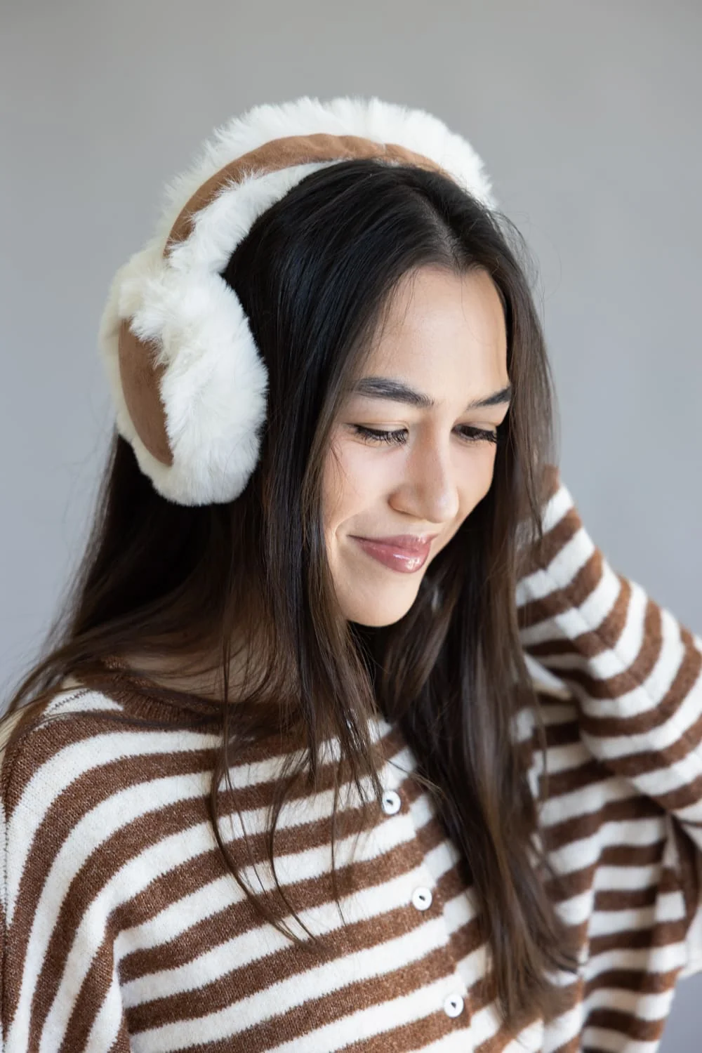 Cozy White and Brown Earmuffs with a Striped Knit Cardigan Cozy White and Brown Earmuffs with a Striped Knit Cardigan — Earmuffs Outfits