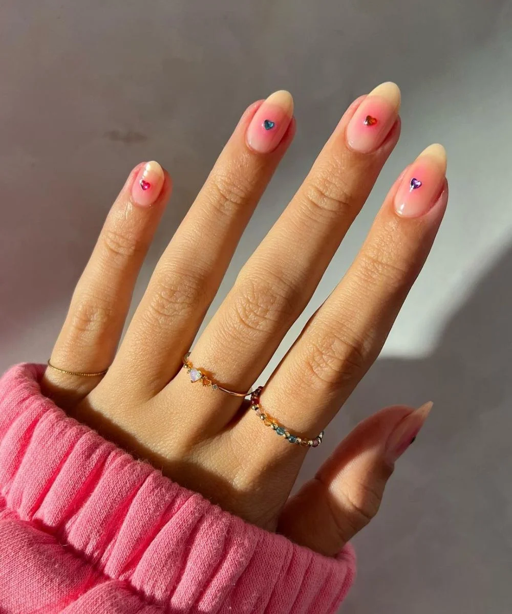 Sheer Pink Gradient with Iridescent Heart Rhinestones Sheer Pink Gradient with Iridescent Heart Rhinestones — Natural Winter Nails