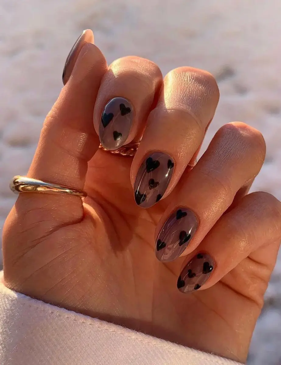 Sheer Grey with Scattered Black Heart Decals — Short Winter Gel Nails