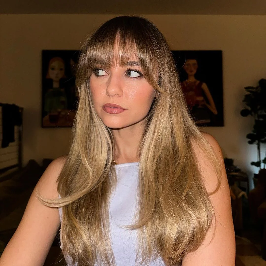Mid-Back Layers With Full Fringe Mid-Back Layers With Full Fringe — Winter Haircuts for Women Over 40