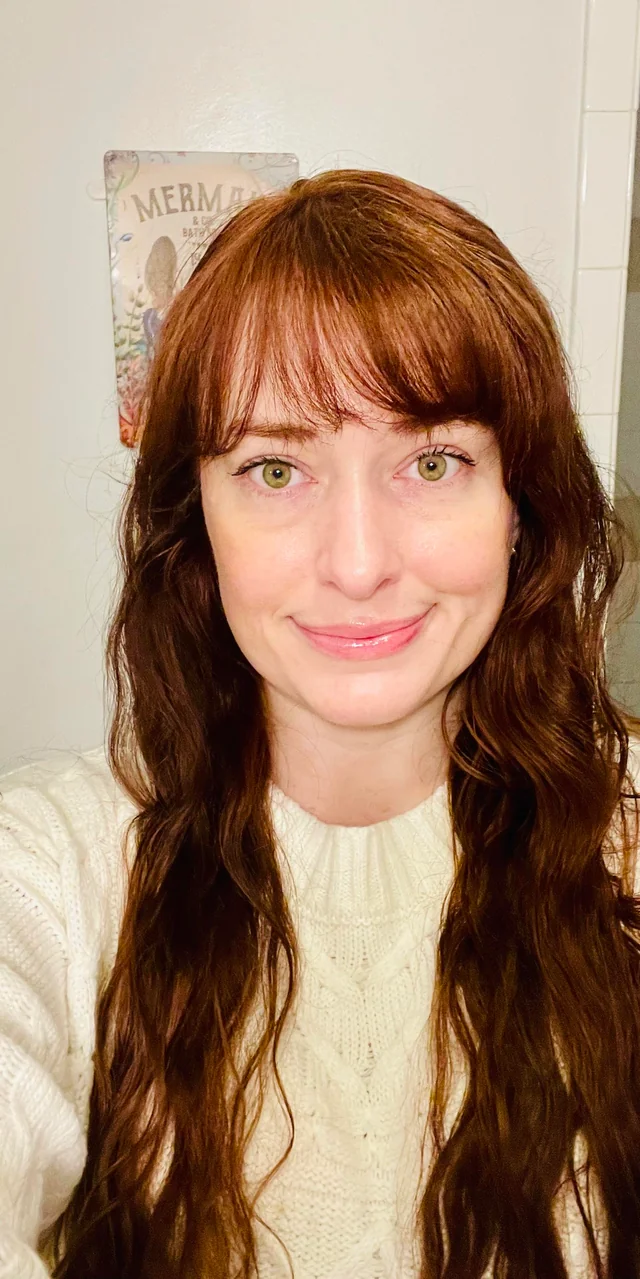 Mid-Back Layers with Full Auburn Bangs Mid-Back Layers with Full Auburn Bangs — Winter Haircuts for Women Over 50