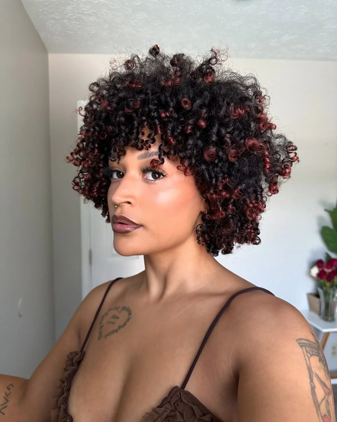 Short Layered Curls With Red Highlights Short Layered Curls With Red Highlights — Winter Layered Haircuts