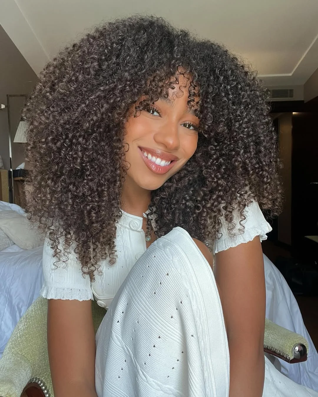 Collarbone Layers And Curtain Bangs — Winter Haircuts for Thick Hair