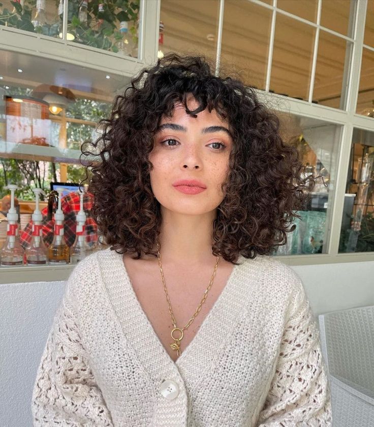 Thick Curly Lob With Curtain Bangs — Winter Shoulder Length Hairstyles