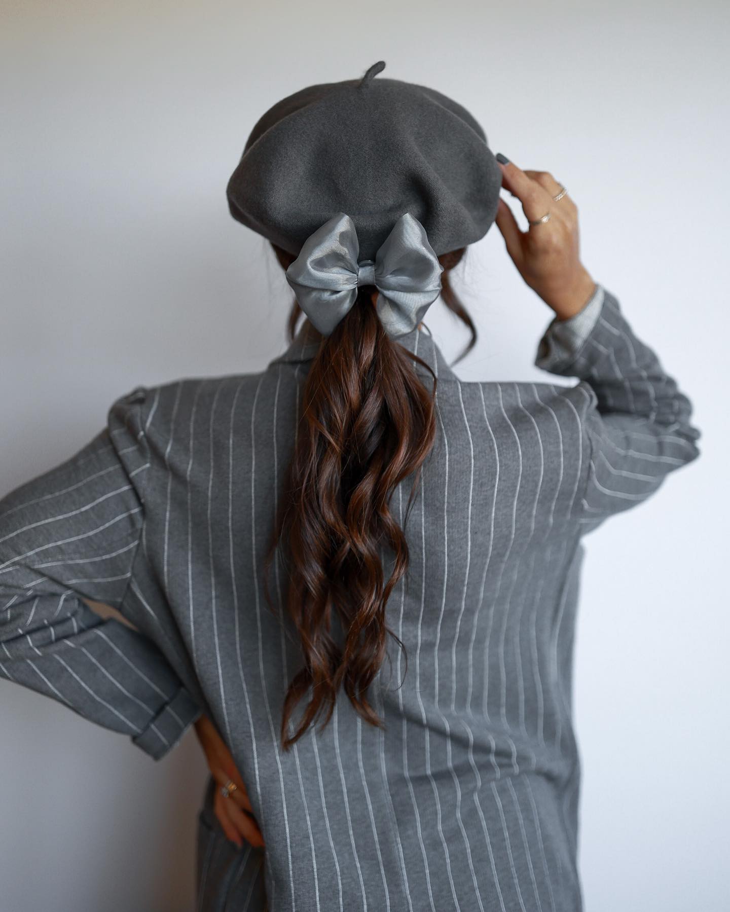 Chic Ponytail With Satin Bow — Winter Hat Hairstyles