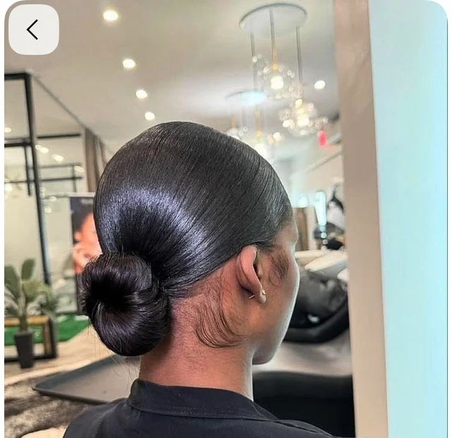 Black Hair Sleek Low Bun — Winter Date Night Hairstyles