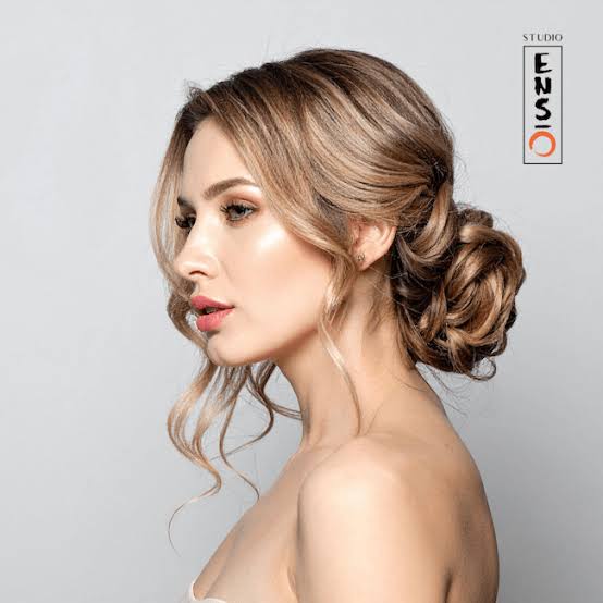 Messy Low Bun With Wispy Bangs — Winter Party Hairstyles