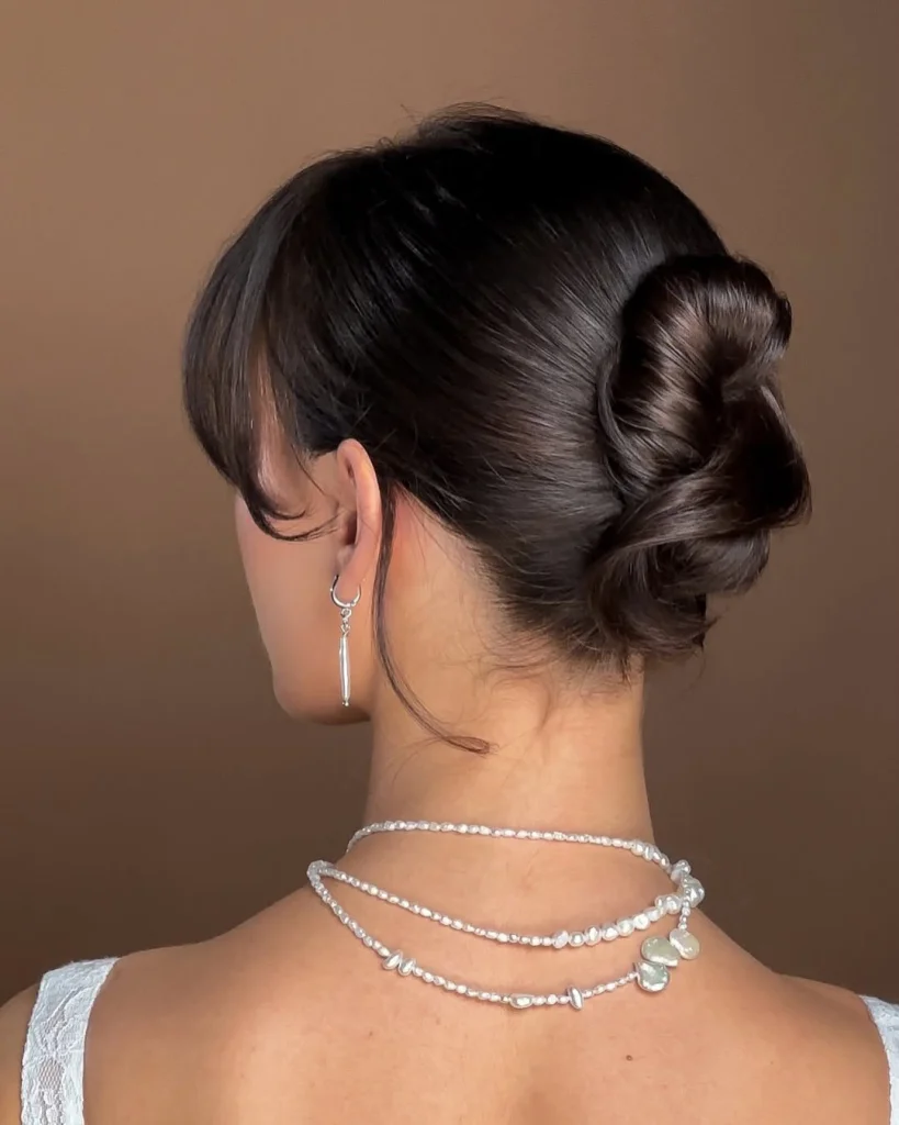 Low Bun With Soft Curls — Winter Party Hairstyles