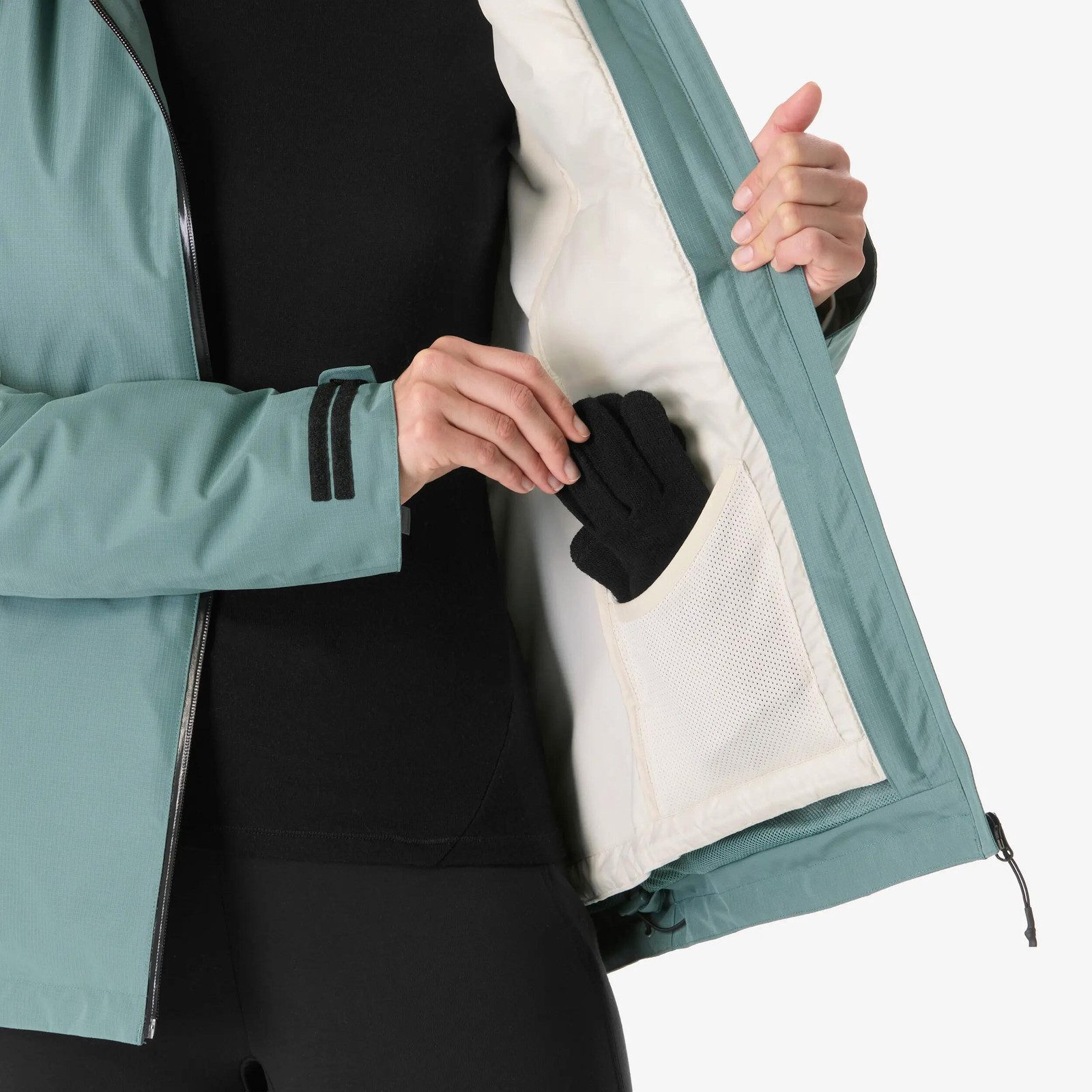 Teal Waterproof Jacket with Black Gloves Detail — Winter Hiking Outfits