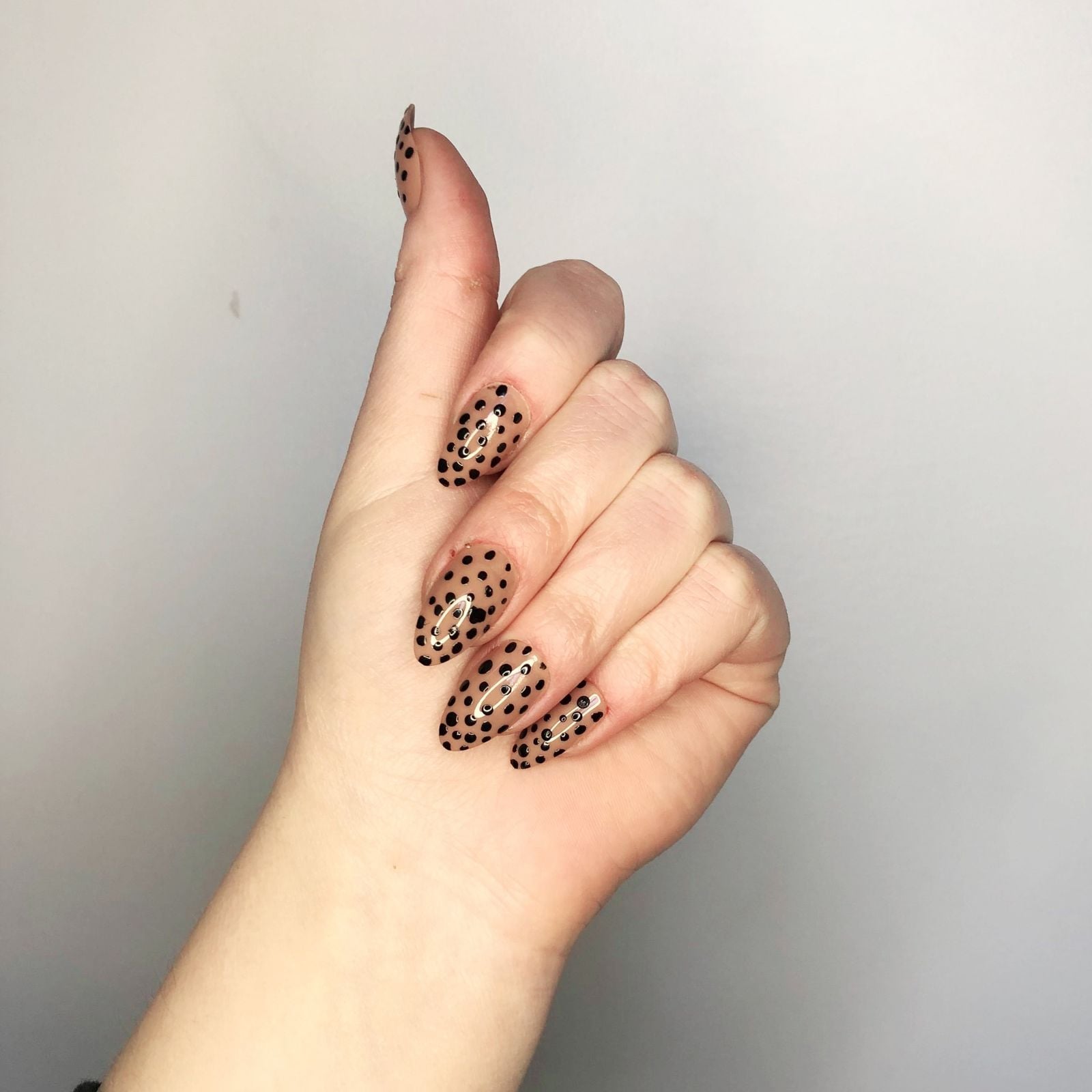 Medium Almond Nude With Black Polka Dots — Nail Art Ideas