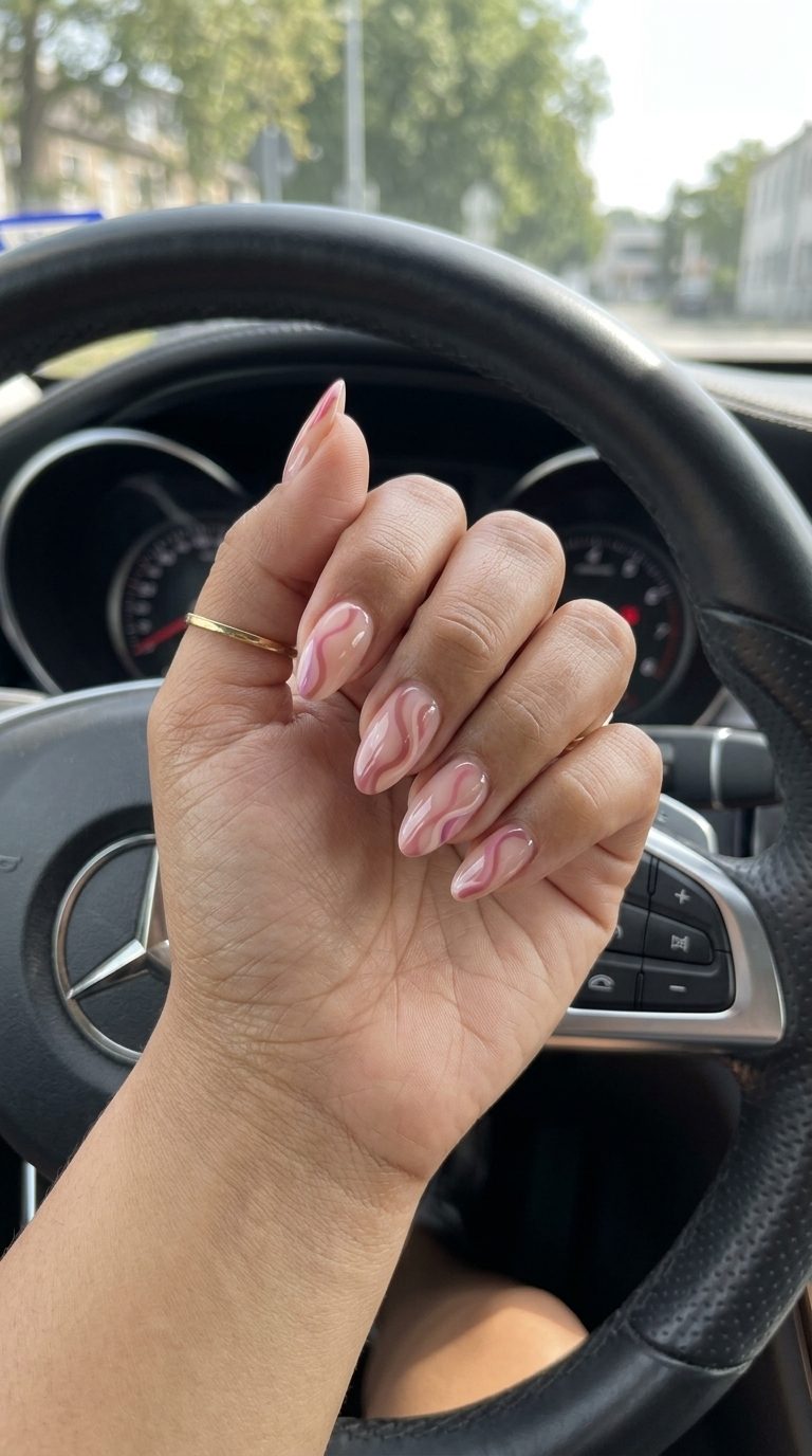 Abstract Rose Swirl Nails 2026 | Bohemian Chic Abstract Rose Swirls on Nude nails for daily wear and artistic expression. Bohemian chic pink summer nails 2026.