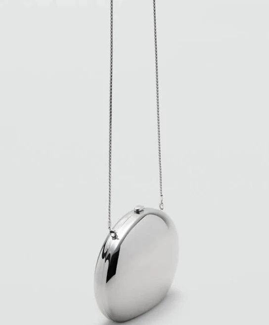 bag MANGO Women's Oval Clutch shop.mango.com $69.99