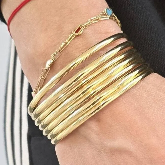 accessory Women's Gold Plated Stackable Bangle Bracelets (Set of 7) Etsy - IsabellaCelini $39.95