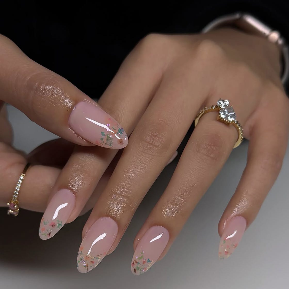 Long Almond Nails With Floral Glitter Accents Long Almond Nails With Floral Glitter Accents — Simple Almond Nails