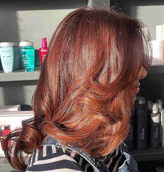 Collarbone Auburn With Lighter Auburn Highlights And Bangs — Simple Auburn Balayage