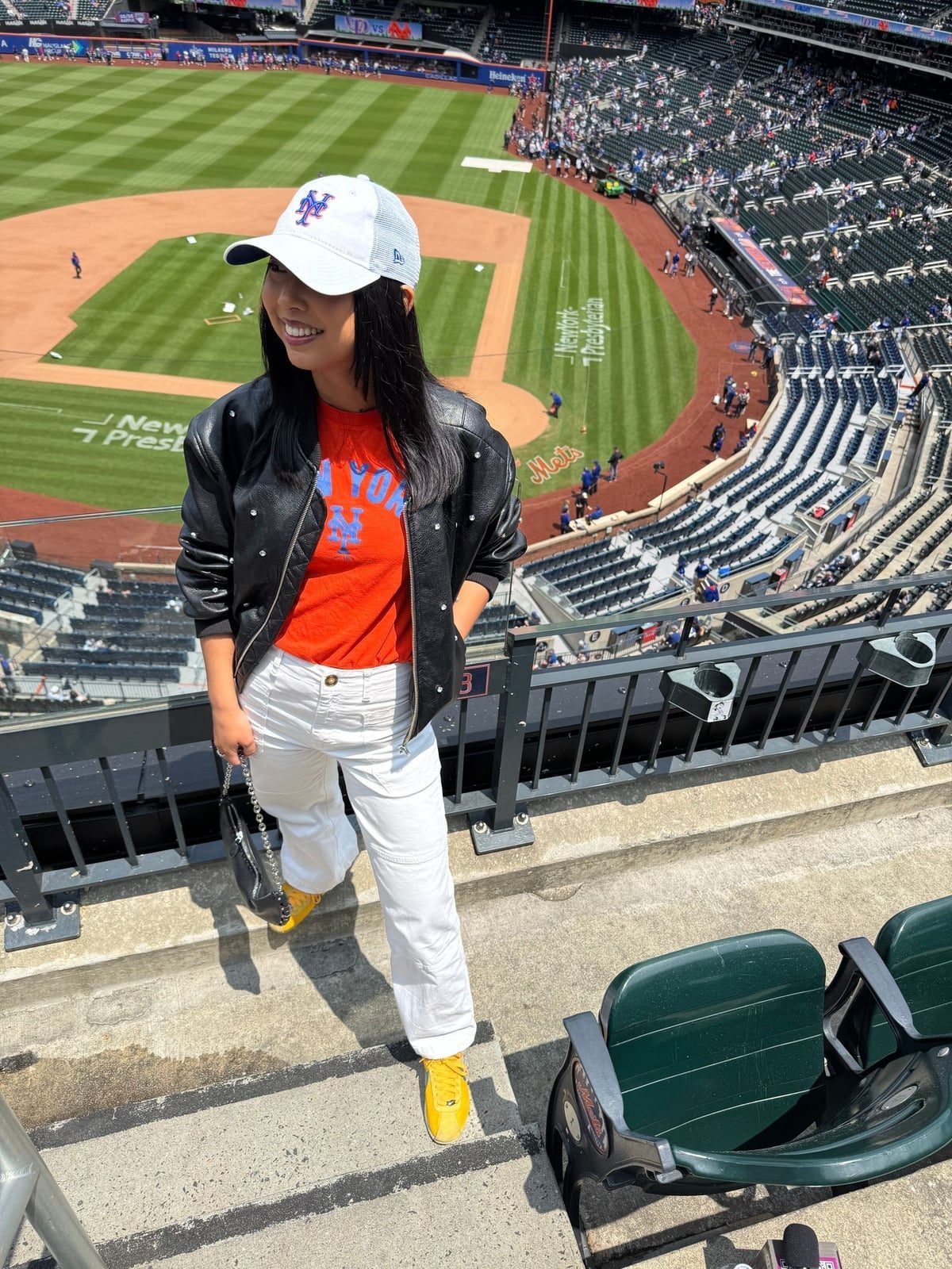 Studded Bomber Jacket and White Pants Casual Look Studded Bomber Jacket and White Pants Casual Look — Simple Baseball Game Outfits