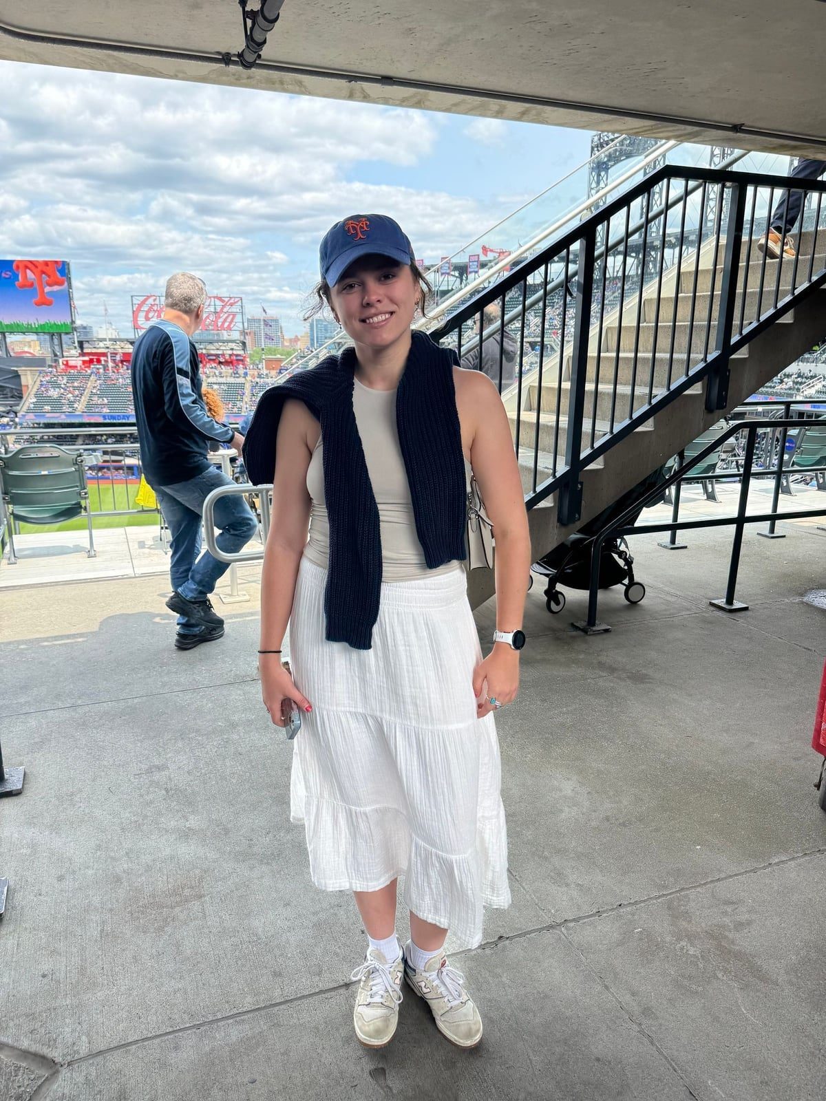 Tiered Midi Skirt with Draped Sweater and Sneakers Tiered Midi Skirt with Draped Sweater and Sneakers — Simple Baseball Game Outfits