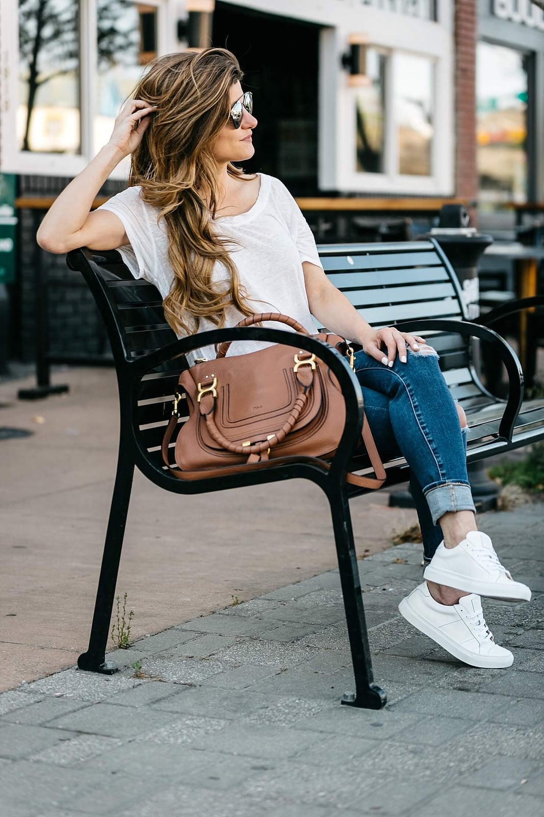 Ripped Blue Jeans and White T-Shirt Casual Chic Ripped Blue Jeans and White T-Shirt Casual Chic — Simple Baseball Game Outfits
