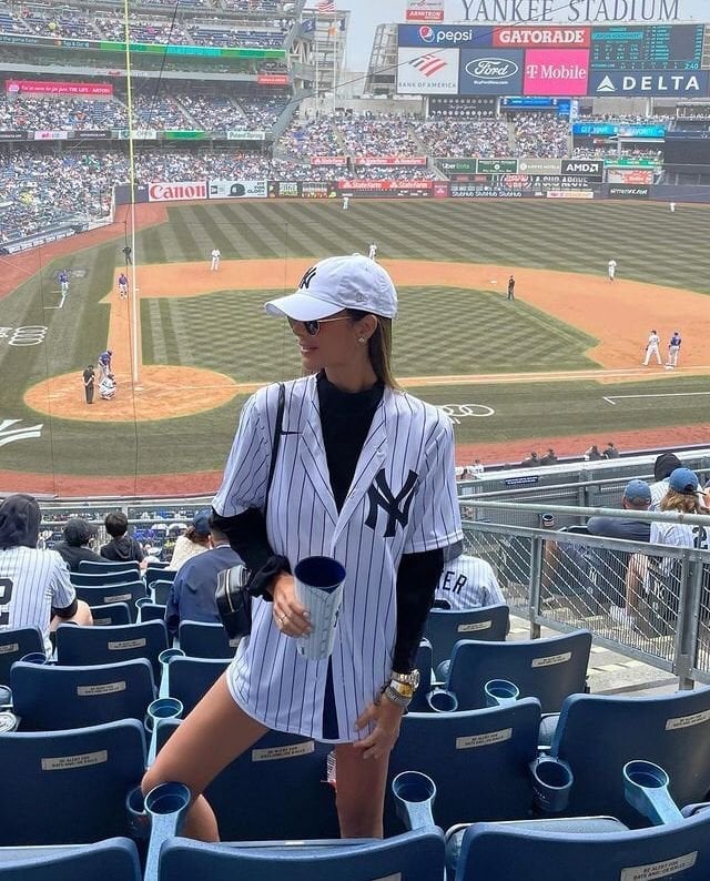 Pinstripe Baseball Jersey Layered Over Long Sleeve Top Pinstripe Baseball Jersey Layered Over Long Sleeve Top — Simple Baseball Game Outfits