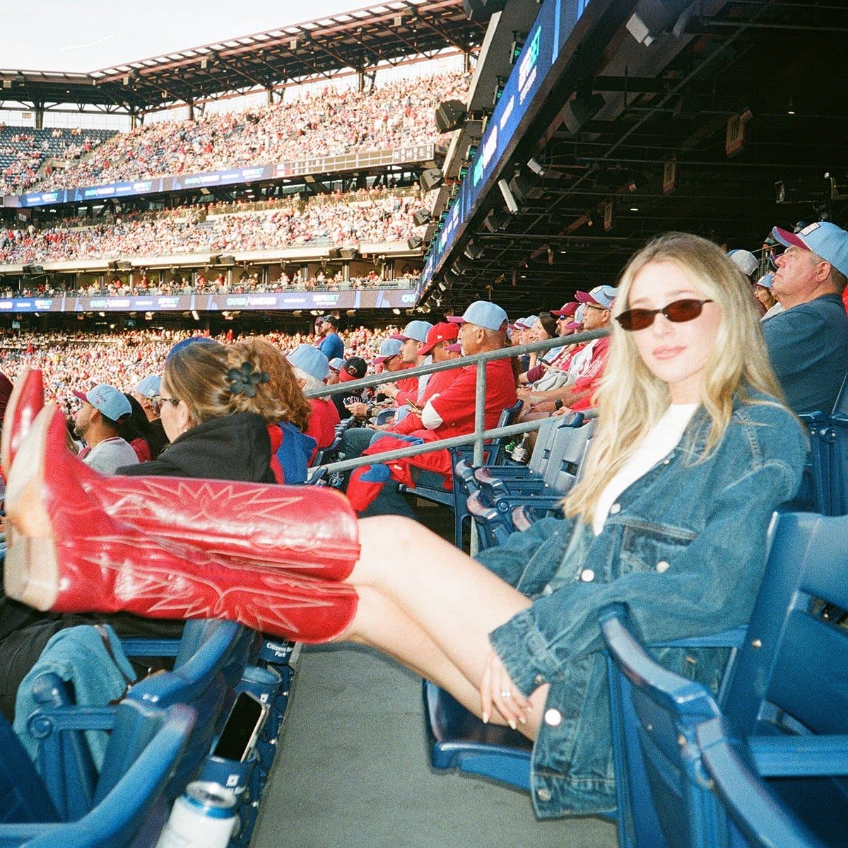 Denim Jacket and Red Cowboy Boots Casual Outfit Denim Jacket and Red Cowboy Boots Casual Outfit — Simple Baseball Game Outfits