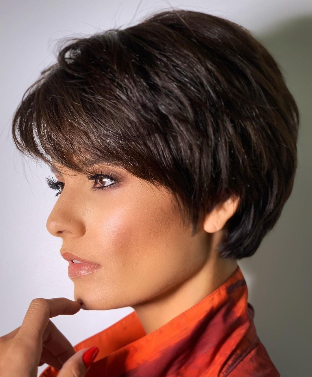 Smooth Dark Brown Bixie With Wispy Bangs Smooth Dark Brown Bixie With Wispy Bangs — Simple Bixie Haircut
