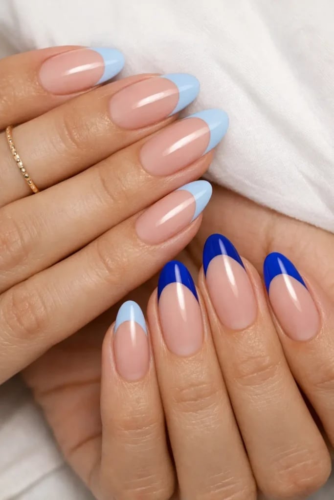 Medium Almonds With Light Blue French Tips, Close-Up Take — Simple Blue French Tip Nails